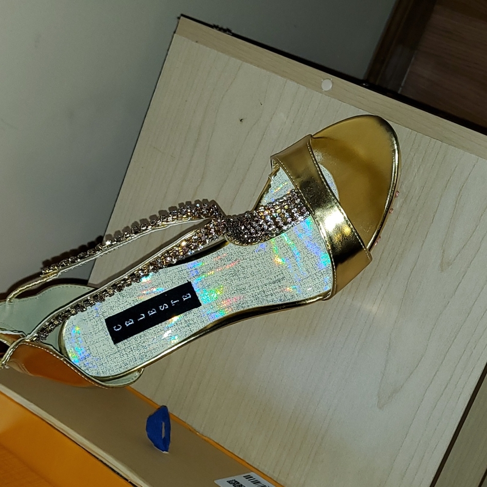SOLD .. Gold high heels